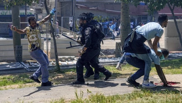 Enfrentamientos entre eritreos dejan más de 100 heridos en Tel Aviv