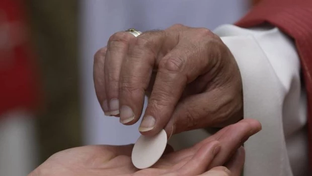 El modo católico de comulgar