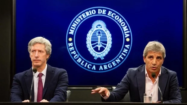 Santiago Bausili y Luis Caputo.