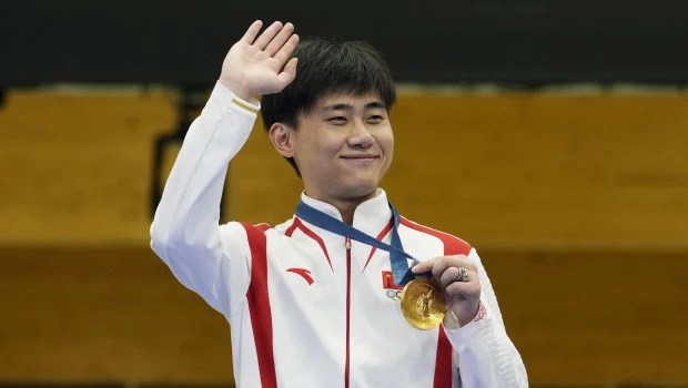 El tirador chino Yukun Liu gana el oro en rifle tres posiciones 50 m.